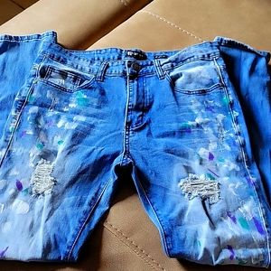 I'm selling these jeans that have paint specks on them, they are made like this.